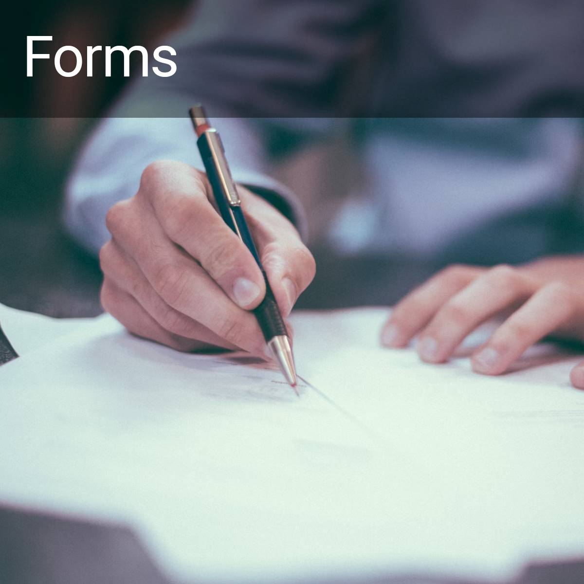 man in business suit checking boxes